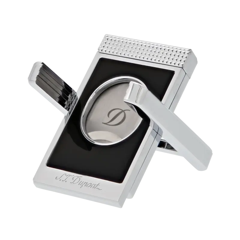 Tagliasigari S.T. Dupont con supporto in lacca nera e cromato con lavorazione punta di diamante; doppia lama per taglio netto.